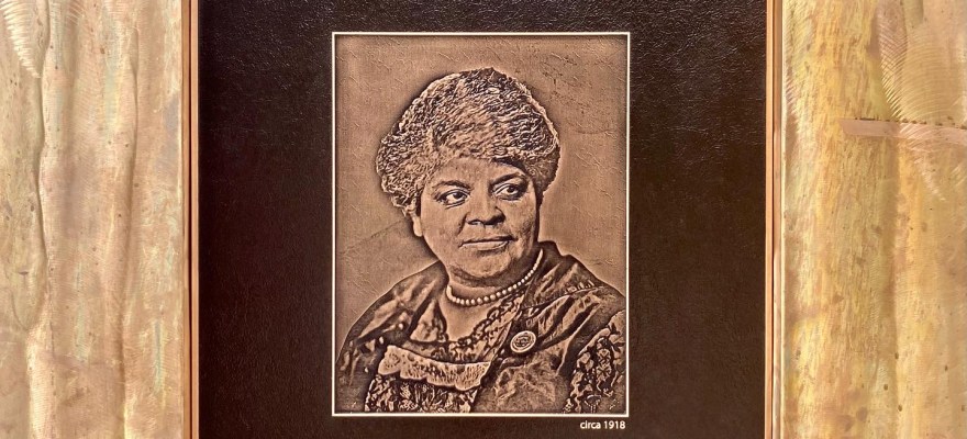 A plaque on the Ida B. Wells monument states, "The way to right wrongs is to turn the light of truth upon them." Photo © Logan Aimone.