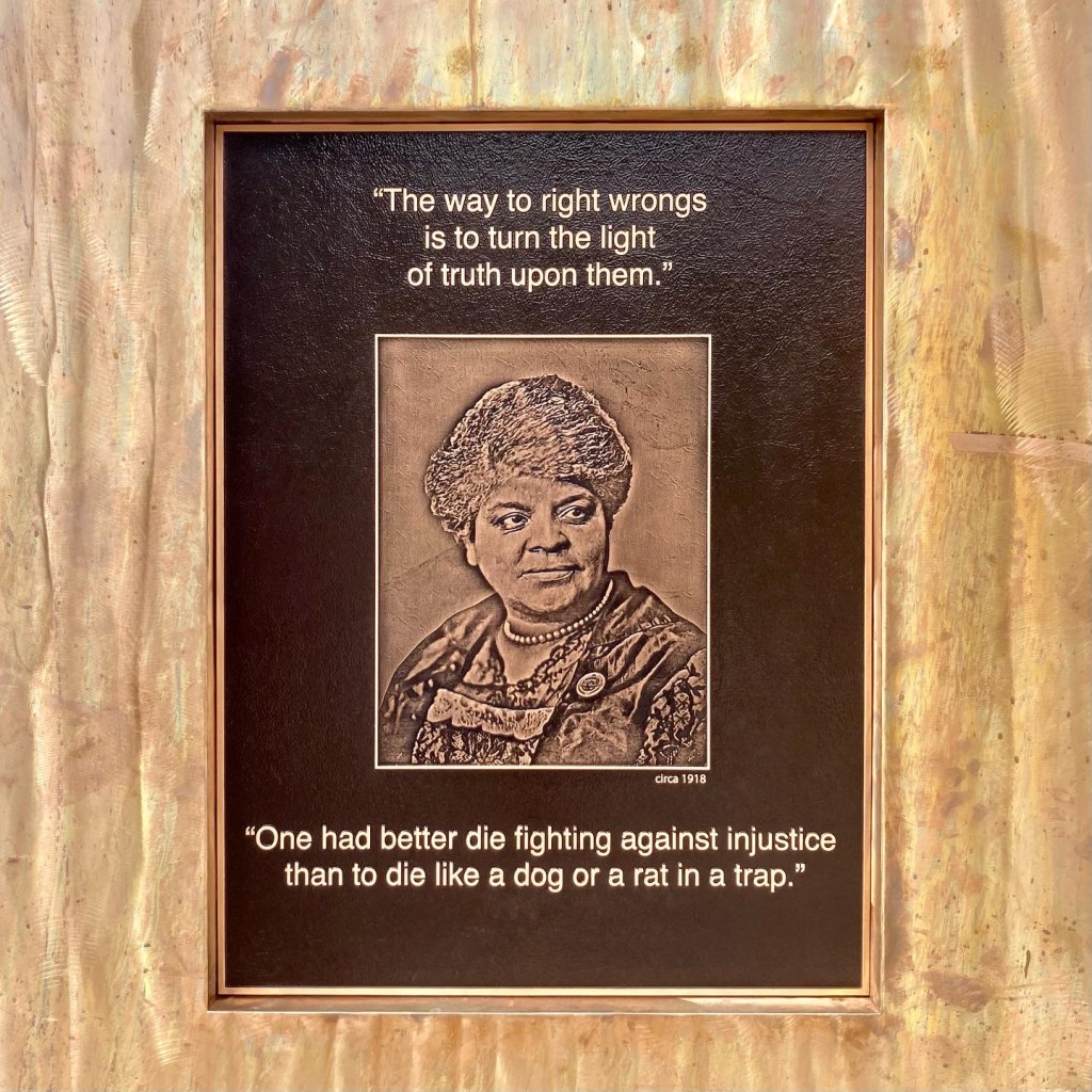 A plaque on the Ida B. Wells monument states, "The way to right wrongs is to turn the light of truth upon them." Photo © Logan Aimone.